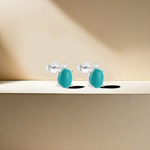 Macro shot of S925 sterling silver stamp on turquoise stud earrings for luxury party style