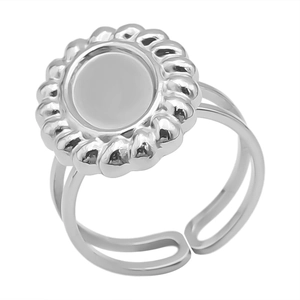 Macro detail of silver stainless steel adjustable ring with flower-shaped gear bezel design