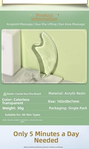 Macro detail of transparent resin facial gua sha tool with wavy edges for eye massage
