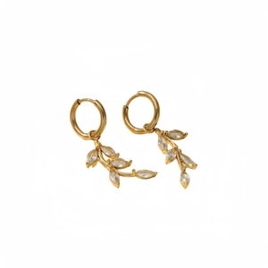Elegant gold leaf earrings with sparkling marquise cut cubic zirconia in a minimalist style
