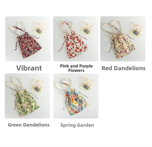 Detail showing five floral canvas drawstring bags with various vintage patterns and textures