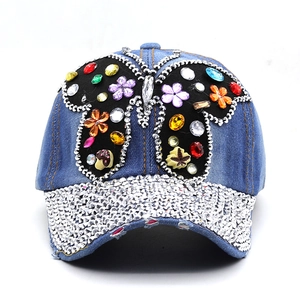 Casquette en jean délavé avec papillon en cristal et visière en strass pour femme