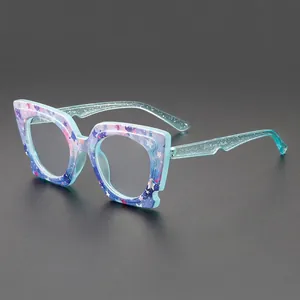 Stylish polygonal blue transparent glasses with star patterns and glitter temples