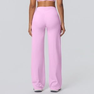 Rear view of high-waisted pink flared yoga pants showing wide waistband and loose fit