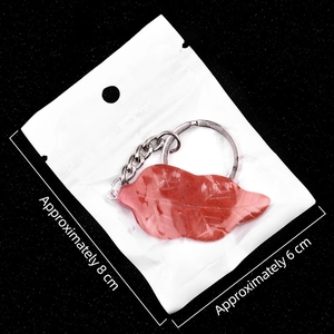 Leaf-shaped red agate crystal keychain pendant with size dimensions 8cm by 6cm