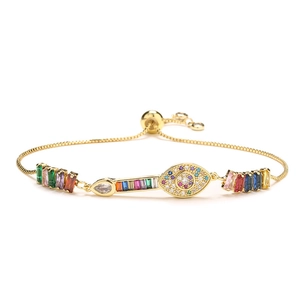 Adjustable evil eye bracelet in gold copper with colorful zircon heart and baguette stones