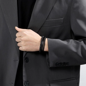 Men's multilayered black lava stone and woven leather bracelet with stainless steel clasp