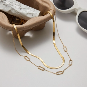 Double layered gold stainless steel necklace with sparkling rhinestone rectangle charms