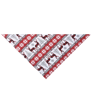Detail of Christmas pet bandana with red buffalo plaid reindeer and snowflake patterns