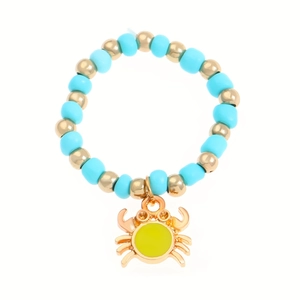 Blue beaded bracelet with a golden crab charm, vibrant summer jewelry for women
