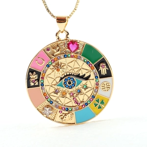 Bohemian gold evil eye pendant necklace with colorful cubic zirconia and multi-charms