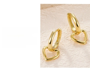 Detail showing triple-layer gold plated S925 silver heart hoop earrings with high luster