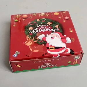 Christmas countdown calendar with 24 wind up toys set in a festive red box