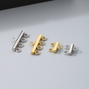 Detail of 2 and 4 hole stainless steel multi-strand slide connectors in gold and silver
