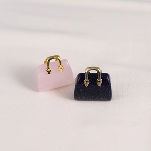 Miniature handbag pendants in rose quartz and blue sandstone with gold handles