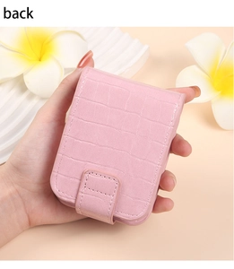 Detailed back view of pink crocodile-pattern PU leather lipstick case with magnetic snap