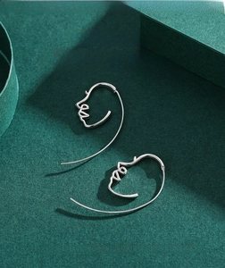 Artistic S925 sterling silver earrings featuring abstract minimalist face profile lines