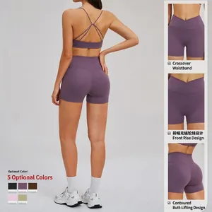 Women's cross waist yoga set with sports bra and high stretch shorts in purple color
