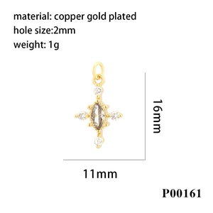 Macro detail of gold plated copper cross pendant with cubic zirconia and size dimensions