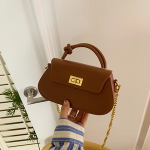 Brown mini leather shoulder bag with gold chain strap and knotted handle for women