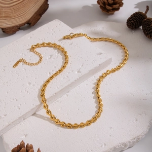 Handcrafted gold twisted link chain necklace in stainless steel for a layered jewelry look