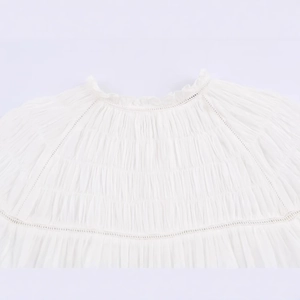 Elegant white poplin shirt with beaded lapel collar and delicate pleated texture detail