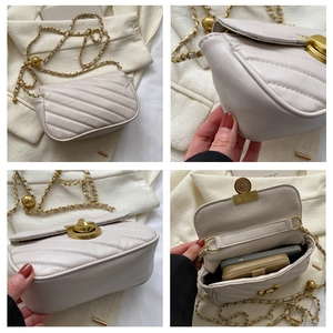 Detail view of cream PU leather crossbody bag with V-quilted pattern and gold hardware