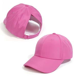 Detail of rose pink ponytail baseball cap with adjustable strap and high messy bun opening
