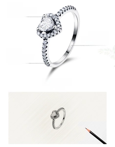 Macro detail of 925 sterling silver ring with hand-set 5A heart-shaped cubic zirconia