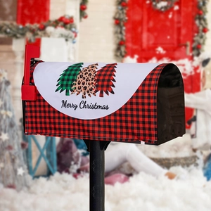 Detail of Christmas mailbox cover with festive trees and red black plaid patterns