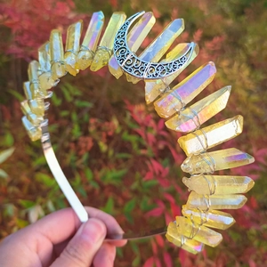 Detail of yellow aura crystals and silver crescent moon woven on a wicca crown headband
