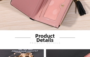 Detail of pink and black women's wallet showing card slots, zipper pouch and fringe