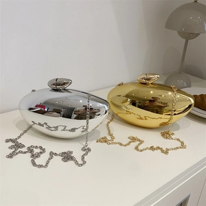 Unique mango shaped gold and silver acrylic box clutch bag with elegant chain strap