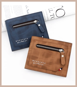 Detail view of men's matte leather wallets in blue and brown with zipper pockets