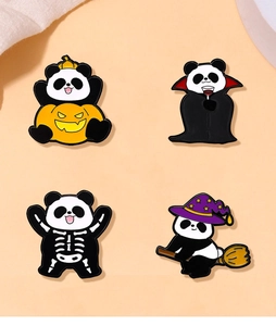 Set of four cute Halloween panda enamel pins featuring pumpkin and wizard hat details