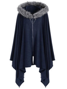 Close-up of navy blue hooded poncho with plush faux fur collar and decorative chain zipper