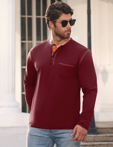 Detail of burgundy long sleeve Henley shirt featuring contrast checkered collar lining and pocket