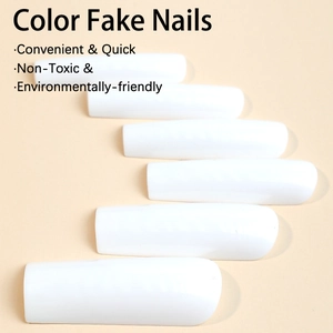 Long rectangle milk white press-on nails set with glossy finish on cream background