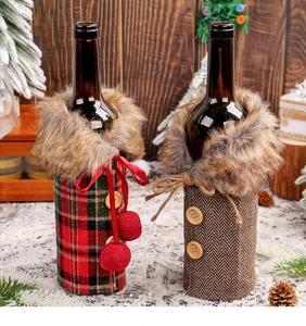 Detail of Christmas wine bottle covers with plush collars and wooden button accents