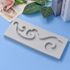 Gray silicone mold with traditional Chinese cloud patterns for DIY cake and craft projects