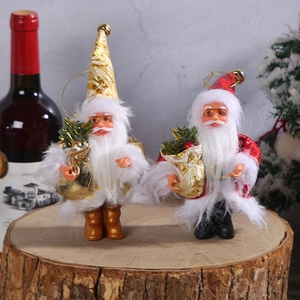 Standing Santa Claus figurines with gold and red hats on wood base for Christmas decor