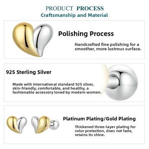 Detail view of heart stud earrings in S925 sterling silver with gold and silver plating