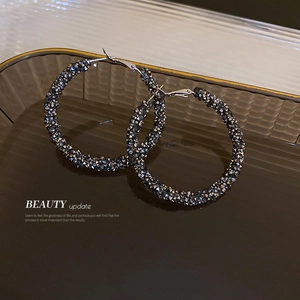 Chic geometric hoop earrings with sparkling rhinestones in a sleek dark grey finish