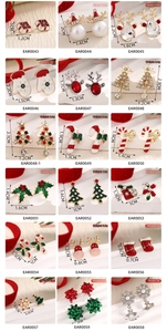 Collection of 18 festive Christmas earrings featuring reindeer and snowflake charms