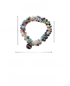 Détail de l'élastique à cheveux avec breloque faite main et perles de cristal colorées
