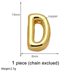 Detailed view of gold-plated letter D copper pendant charm with measurements 13mm by 8mm