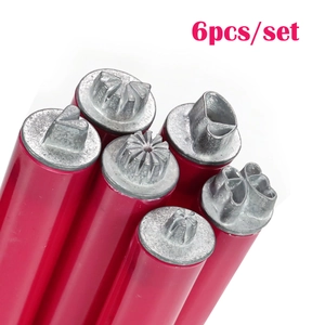 Detail of 6pcs nail art stamp pens with red handles and various metal embossing heads
