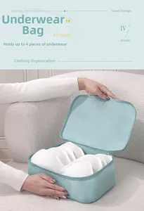 Waterproof light green travel underwear organizer bag holding four bras for efficient packing