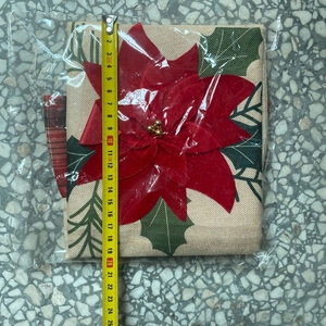 Linen Christmas chair cover with Poinsettia embroidery measuring 24cm in length