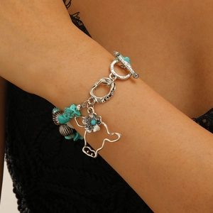 Western turquoise cow head bracelet in vintage silver with floral charms for women